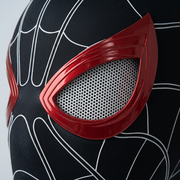 Close-up of the ShadowMotion mask's red eye rim, mesh eye opening, and white webbing texture