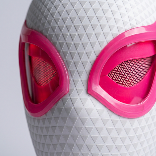 Close-up of the Gwen mask pink eye frames and white surface texture