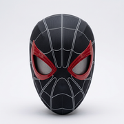 Black webbed ShadowMotion mask with red-rimmed mesh eyes on a pale gray studio background, angled view